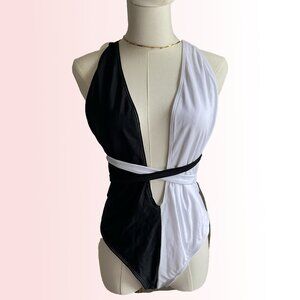 Split black and white strappy one piece swimsuit NWOT
